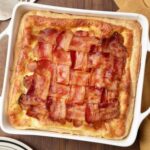 Photo of bacon in lattice pattern covering a casserole