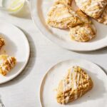A photo of saffron cream scones on plates and a serving plate